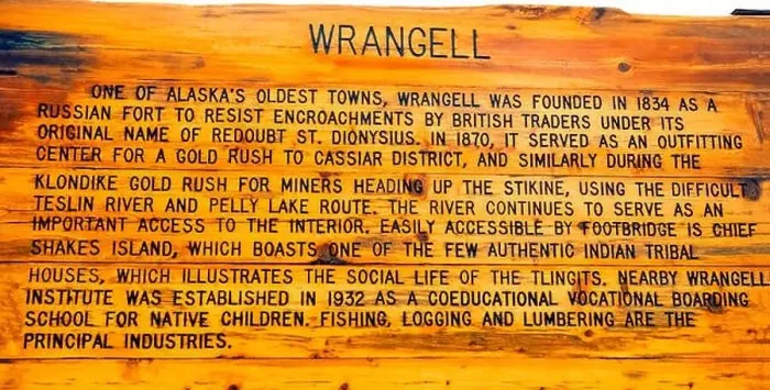 Framed Print : An outdoor weather-worn wooden sign explains the early history of Wrangell Framed Print : An outdoor weather-worn wooden sign explains the early history of Wrangell