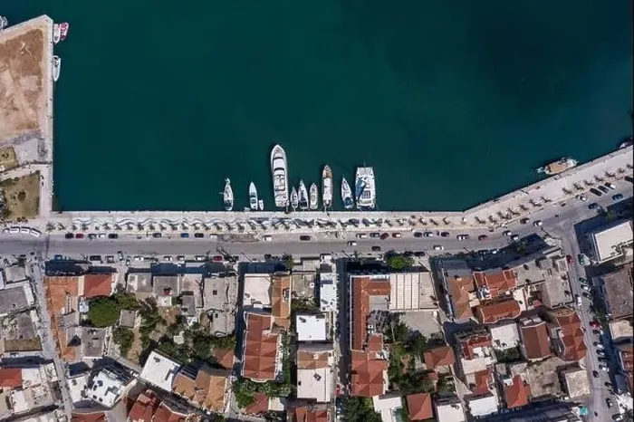 Framed Print : Overhead aerial drone shot of Argostolion bund street in summer afternoon in Kefalonia island Framed Print : Overhead aerial drone shot of Argostolion bund street in summer afternoon in Kefalonia island