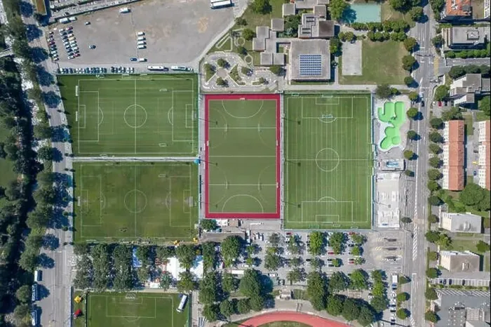 Framed Print : Overhead aerial drone shot view of football fields in Lugano city, Switzerland Framed Print : Overhead aerial drone shot view of football fields in Lugano city, Switzerland