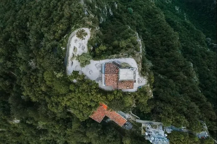 Framed Print : Overhead aerial drone shot view of top of monte salvatore with chapel and observatory in Lugano, Switzerland Framed Print : Overhead aerial drone shot view of top of monte salvatore with chapel and observatory in Lugano, Switzerland