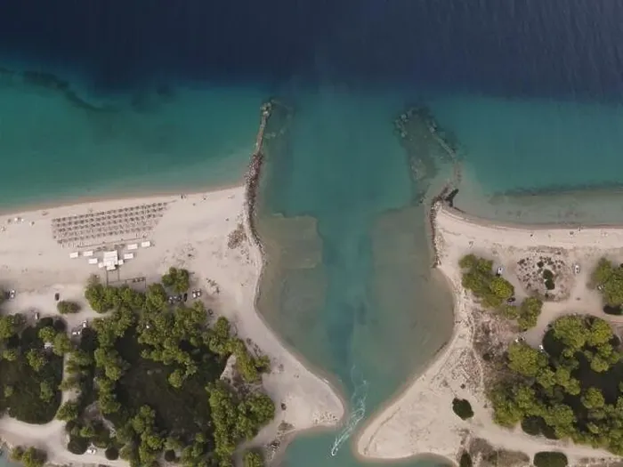 Framed Print : Overhead drone photo over the tropical blue ocean and the bay of Glarokavos in Paliouri, Halkidiki, Greece Framed Print : Overhead drone photo over the tropical blue ocean and the bay of Glarokavos in Paliouri, Halkidiki, Greece