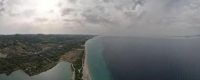 Framed Print : Overhead drone photo over the tropical blue ocean and the bay of Glarokavos in Paliouri, Halkidiki, Greece Framed Print : Overhead drone photo over the tropical blue ocean and the bay of Glarokavos in Paliouri, Halkidiki, Greece