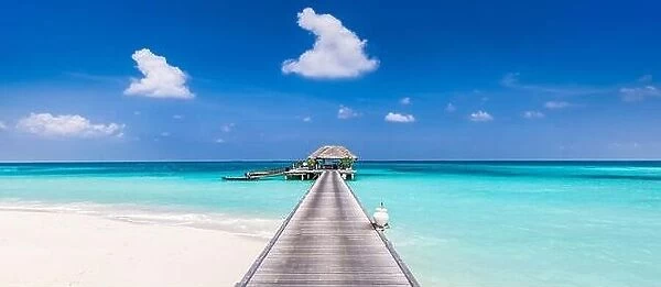 Overwater bungalow in the Indian Ocean, shore coast landscape. Tropical island beach, amazing blue sky, endless sea view, long jetty horizon exotic