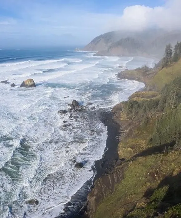 Framed Print : The Pacific Ocean washes against the rocky coastline of northern Oregon. This beautiful, wild region is often covered by a dark foggy marine layer Framed Print : The Pacific Ocean washes against the rocky coastline of northern Oregon. This beautiful, wild region is often covered by a dark foggy marine layer