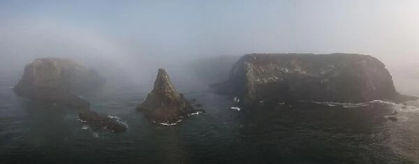 The Pacific Ocean washes against the rugged and scenic coastline of California in Mendocino, California. This part of the west coast is often foggy