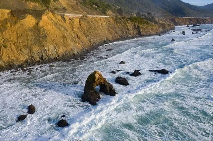 Framed Print : The Pacific Ocean washes against the rugged shoreline of northern California on a beautiful day. The Pacific Coast Highway runs along this area Framed Print : The Pacific Ocean washes against the rugged shoreline of northern California on a beautiful day. The Pacific Coast Highway runs along this area