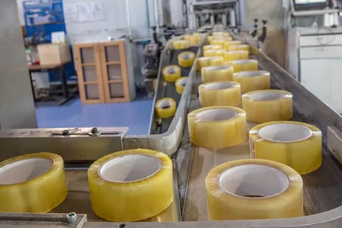 Framed Print : Packing tape factory. Production of duct tape