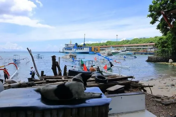 Framed Print : Padang Bai, Bali in Indonesia - February 7 2024: hustle and bustle at the harbor in east Bali Framed Print : Padang Bai, Bali in Indonesia - February 7 2024: hustle and bustle at the harbor in east Bali