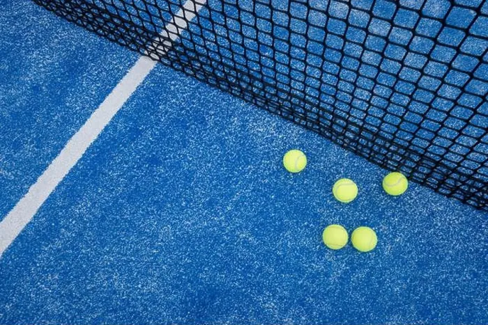 Framed Print : five paddle tennis ball on the net of a blue paddle tennis court Framed Print : five paddle tennis ball on the net of a blue paddle tennis court