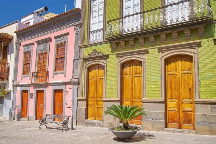 Framed Print : Painted houses on the main street in Teror, Gran Canaria, Spain Framed Print : Painted houses on the main street in Teror, Gran Canaria, Spain
