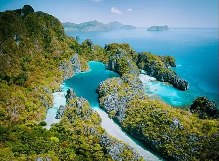 Framed Print : Palawan, Philippines aerial drone view of turquoise lagoon and limestone cliffs. El Nido Marine Reserve Park Framed Print : Palawan, Philippines aerial drone view of turquoise lagoon and limestone cliffs. El Nido Marine Reserve Park