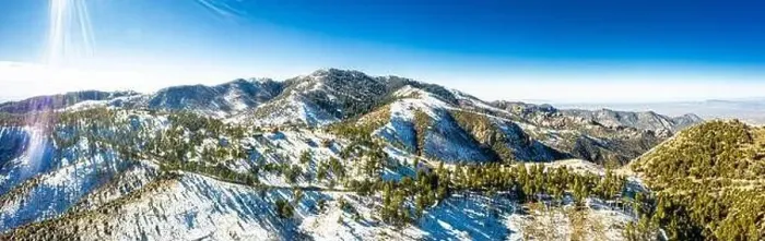 Framed Print : A panorama aerial image of the summit of Mt. Lemmon outside of Tucson, Arizona covered in snow with a vibrant blue sky Framed Print : A panorama aerial image of the summit of Mt. Lemmon outside of Tucson, Arizona covered in snow with a vibrant blue sky
