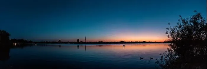 Framed Print : Panorama of the Aussenalster in Hamburg made in calm atmosphere of a spring evening after sunset highlighing Framed Print : Panorama of the Aussenalster in Hamburg made in calm atmosphere of a spring evening after sunset highlighing