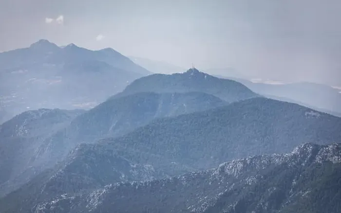 Framed Print : Panorama of beautiful silhouette mountains in blue tones with haze and clouds