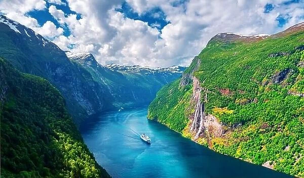 Panorama of breathtaking view of Sunnylvsfjorden fjord and famous Seven Sisters waterfalls, near Geiranger village in western Norway
