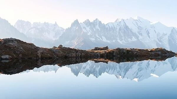 Panorama of Chesery lake (Lac De Cheserys) and snowy Monte Bianco mountains range on background, Chamonix, France Alps