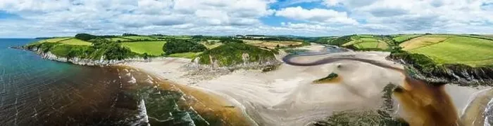 Framed Print : Panorama of Cliffs over Mothecombe Beach and Red Cove from a drone Framed Print : Panorama of Cliffs over Mothecombe Beach and Red Cove from a drone