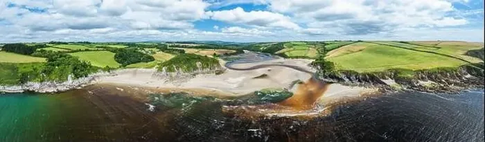 Framed Print : Panorama of Cliffs over Mothecombe Beach and Red Cove from a drone Framed Print : Panorama of Cliffs over Mothecombe Beach and Red Cove from a drone