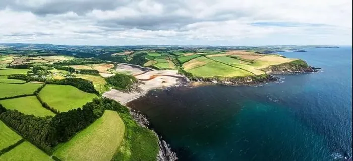 Framed Print : Panorama of Cliffs over Mothecombe Beach and Red Cove from a drone Framed Print : Panorama of Cliffs over Mothecombe Beach and Red Cove from a drone