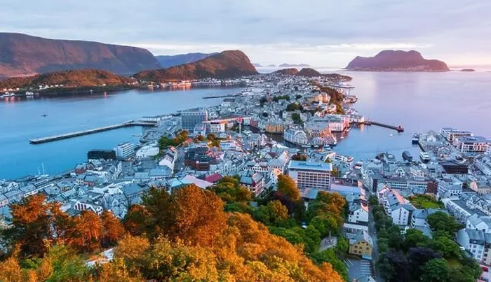 Framed Print : Panorama of colorful sunset in Alesund port town on western coast of Norway. Place where the ocean meet the mountains. Landscape photography Framed Print : Panorama of colorful sunset in Alesund port town on western coast of Norway. Place where the ocean meet the mountains. Landscape photography