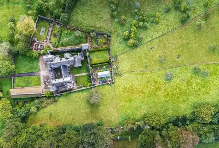 Framed Print : Top Down panorama of Compton Castle from a drone, Devon, England, Europe Framed Print : Top Down panorama of Compton Castle from a drone, Devon, England, Europe