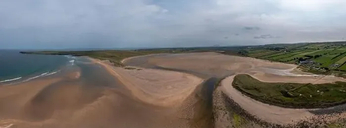 Framed Print : A panorama drone landscape view of the beautiful golden sand beach at Lacken Strand on the coast of Framed Print : A panorama drone landscape view of the beautiful golden sand beach at Lacken Strand on the coast of