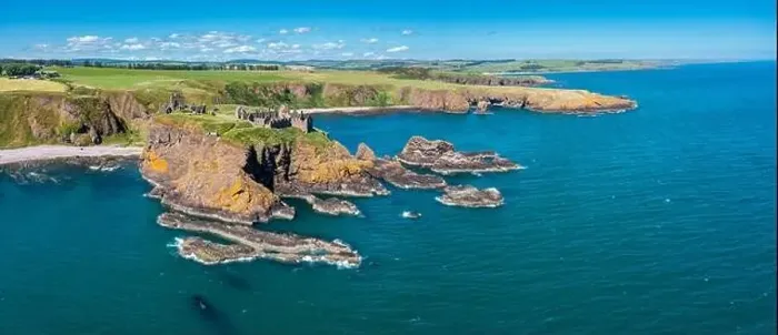 Framed Print : Panorama drone view of Dunnottar Castle and the wild coast of Aberdeenshire