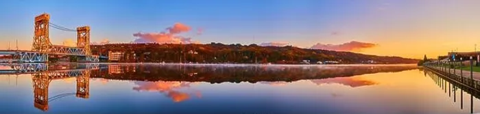 Framed Print : Panorama of Houghton harbor with lift bridge and glassy river surface and docks in the fall Framed Print : Panorama of Houghton harbor with lift bridge and glassy river surface and docks in the fall