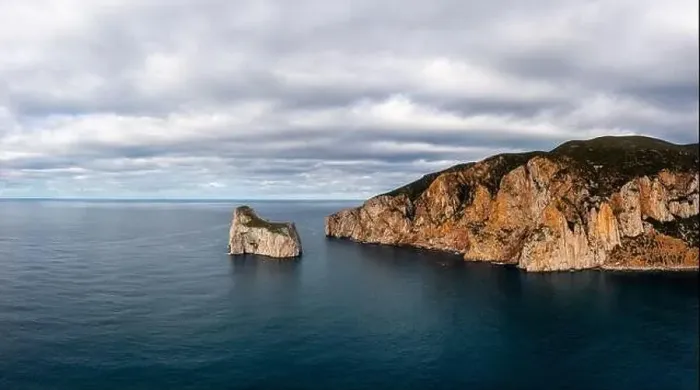 Framed Print : Panorama landscape of the cliffs and sea stacks at Porto Flavia on Sardinia Framed Print : Panorama landscape of the cliffs and sea stacks at Porto Flavia on Sardinia