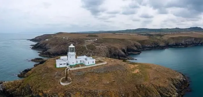 Framed Print : Panorama landscape of the Pembrokeshire coast with the historic Strumble Head Lighthouse Framed Print : Panorama landscape of the Pembrokeshire coast with the historic Strumble Head Lighthouse