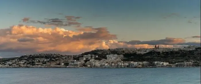 Framed Print : A panorama landscape view of Mellieha Bay in Malta at sunset Framed Print : A panorama landscape view of Mellieha Bay in Malta at sunset