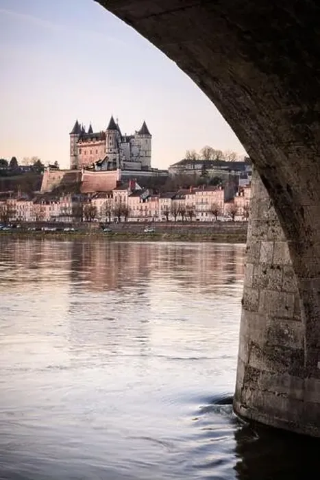 Framed Print : Panorama of Saumur skyline under a bridge arch with medieval castle and churches Framed Print : Panorama of Saumur skyline under a bridge arch with medieval castle and churches