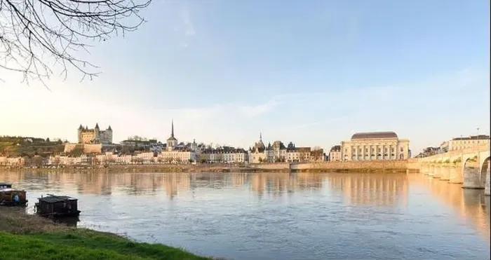 Framed Print : Panorama of Saumur skyline with medieval castle and churches, old town centre and bridge along the Loire river, France Framed Print : Panorama of Saumur skyline with medieval castle and churches, old town centre and bridge along the Loire river, France