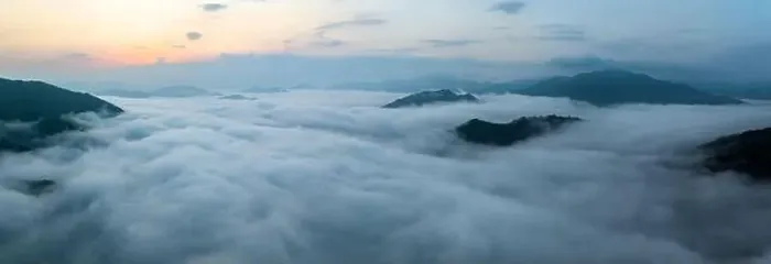 Framed Print : Panorama of sea of clouds around mountain peaks at sunrise Framed Print : Panorama of sea of clouds around mountain peaks at sunrise