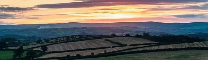 Framed Print : Panorama of Sunset over the fields from drone, Devon, England, Europe Framed Print : Panorama of Sunset over the fields from drone, Devon, England, Europe