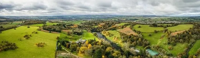 Framed Print : Top down panorama over Ugbrooke House and Gardens from a drone in the colors of fall, Exeter, Devon, England, Europe Framed Print : Top down panorama over Ugbrooke House and Gardens from a drone in the colors of fall, Exeter, Devon, England, Europe