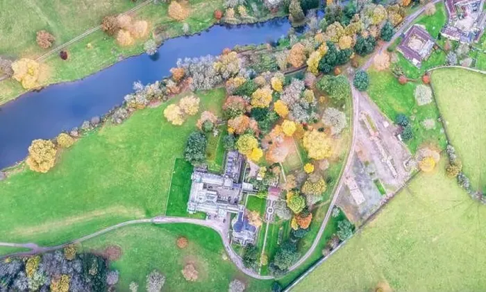 Framed Print : Top down panorama over Ugbrooke House and Gardens from a drone in the colors of fall, Exeter, Devon, England, Europe Framed Print : Top down panorama over Ugbrooke House and Gardens from a drone in the colors of fall, Exeter, Devon, England, Europe