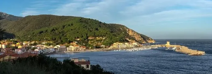 Framed Print : A panorama view of the town and harbour of Marciana Marina on Elba Island