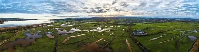 Framed Print : Panorama over Wetlands and Marshes in RSPB Exminster and Powderham Marshe from a drone, Exeter, Devon, England