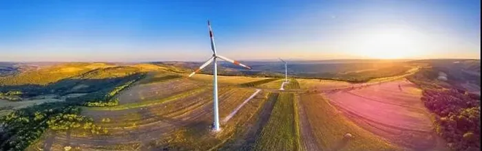 Framed Print : Panorama of wind turbine in a windfarm on hills in Moldova at sunset, aerial drone view with glowing sun Framed Print : Panorama of wind turbine in a windfarm on hills in Moldova at sunset, aerial drone view with glowing sun