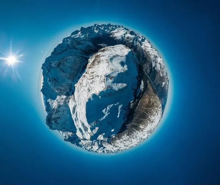 Framed Print : Panoramic aerial drone little planet view of an snowy mountains Framed Print : Panoramic aerial drone little planet view of an snowy mountains