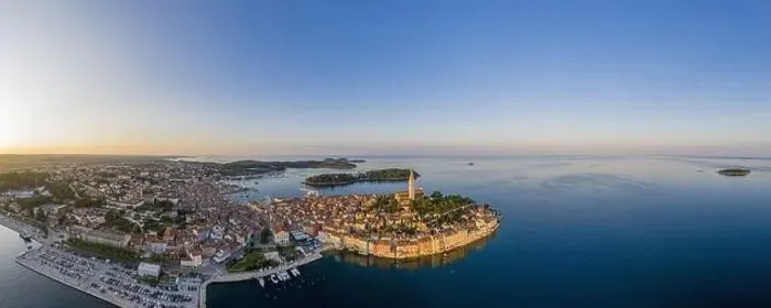 Framed Print : Panoramic aerial drone picture of the historic city Rovinj in Croatia during sunrise in summer Framed Print : Panoramic aerial drone picture of the historic city Rovinj in Croatia during sunrise in summer