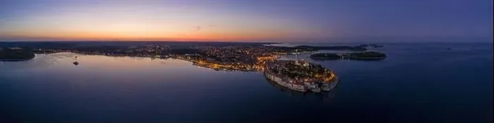 Framed Print : Panoramic aerial drone picture of the historic city Rovinj in Croatia during sunrise in summer Framed Print : Panoramic aerial drone picture of the historic city Rovinj in Croatia during sunrise in summer