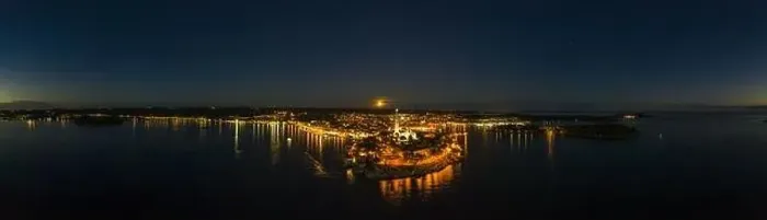 Framed Print : Panoramic aerial drone picture of the historic city Rovinj and harbor with full moon in Croatia during sunset in summer Framed Print : Panoramic aerial drone picture of the historic city Rovinj and harbor with full moon in Croatia during sunset in summer