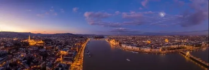 Framed Print : Panoramic aerial drone shot of Danube river with lighted quai wi Framed Print : Panoramic aerial drone shot of Danube river with lighted quai wi
