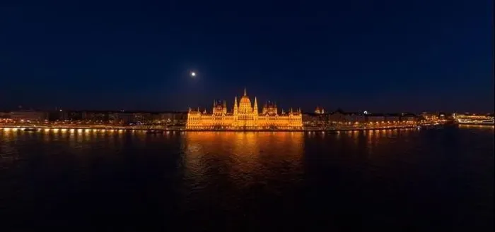 Framed Print : Panoramic aerial drone shot of front facade of Hungarian Parliament with lights on in Budapest night Framed Print : Panoramic aerial drone shot of front facade of Hungarian Parliament with lights on in Budapest night