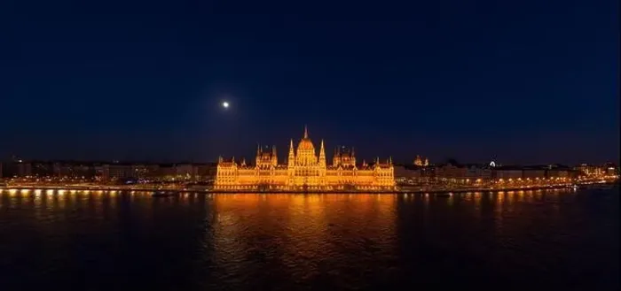Framed Print : Panoramic aerial drone shot of front facade of Hungarian Parliament with lights on in Budapest night Framed Print : Panoramic aerial drone shot of front facade of Hungarian Parliament with lights on in Budapest night