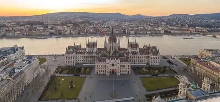 Framed Print : Panoramic aerial drone shot of Hungarian Parliament by Danube river in Kossuth Square in Budapest sunset Framed Print : Panoramic aerial drone shot of Hungarian Parliament by Danube river in Kossuth Square in Budapest sunset