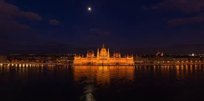 Framed Print : Panoramic aerial drone shot of Hungarian Parliament with lights on during Budapest evening