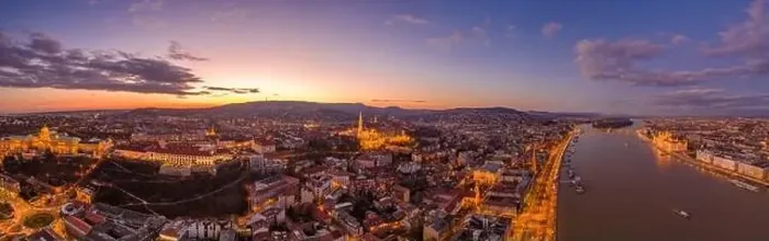 Framed Print : Panoramic aerial drone shot of lighted Matthias Churh Buda castle Fisherman Bastion on hill by Danube in Budapest sunset Framed Print : Panoramic aerial drone shot of lighted Matthias Churh Buda castle Fisherman Bastion on hill by Danube in Budapest sunset